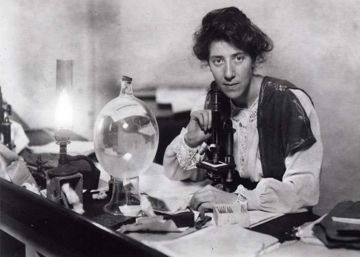 Marie Stopes, palaeobotanist, working in her laboratory, 1904. Her geological achievements and those of other women in geology feature in HOGG publications. Image credit: Marie Stopes International (with permission, in being used to further understanding about Dr Marie Stopes.)